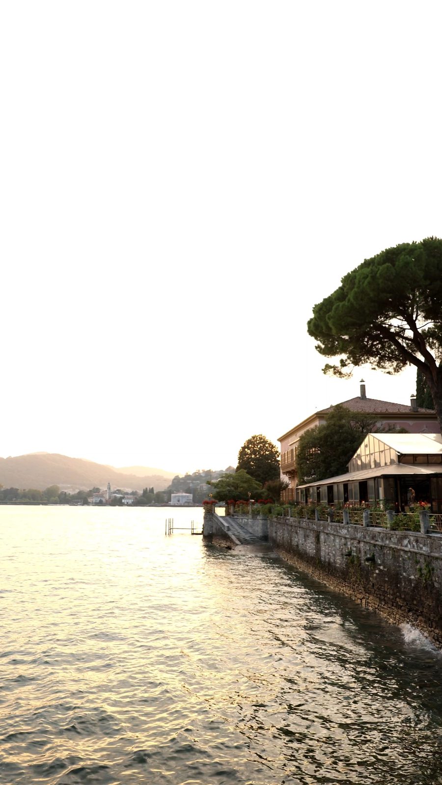 Sunset over Lake Como from the shore of Villa Pizzo, Cernobbio, on Scott and Sydney's wedding day
